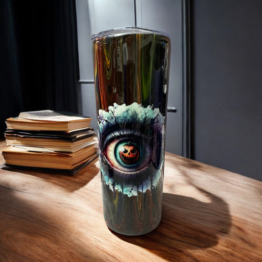 Creepy Eye with pumpkin inside 20 oz tumbler