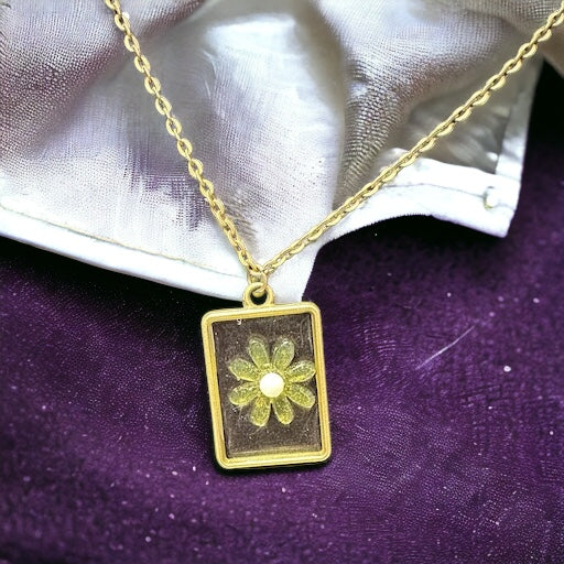 Flower on an antique pendant