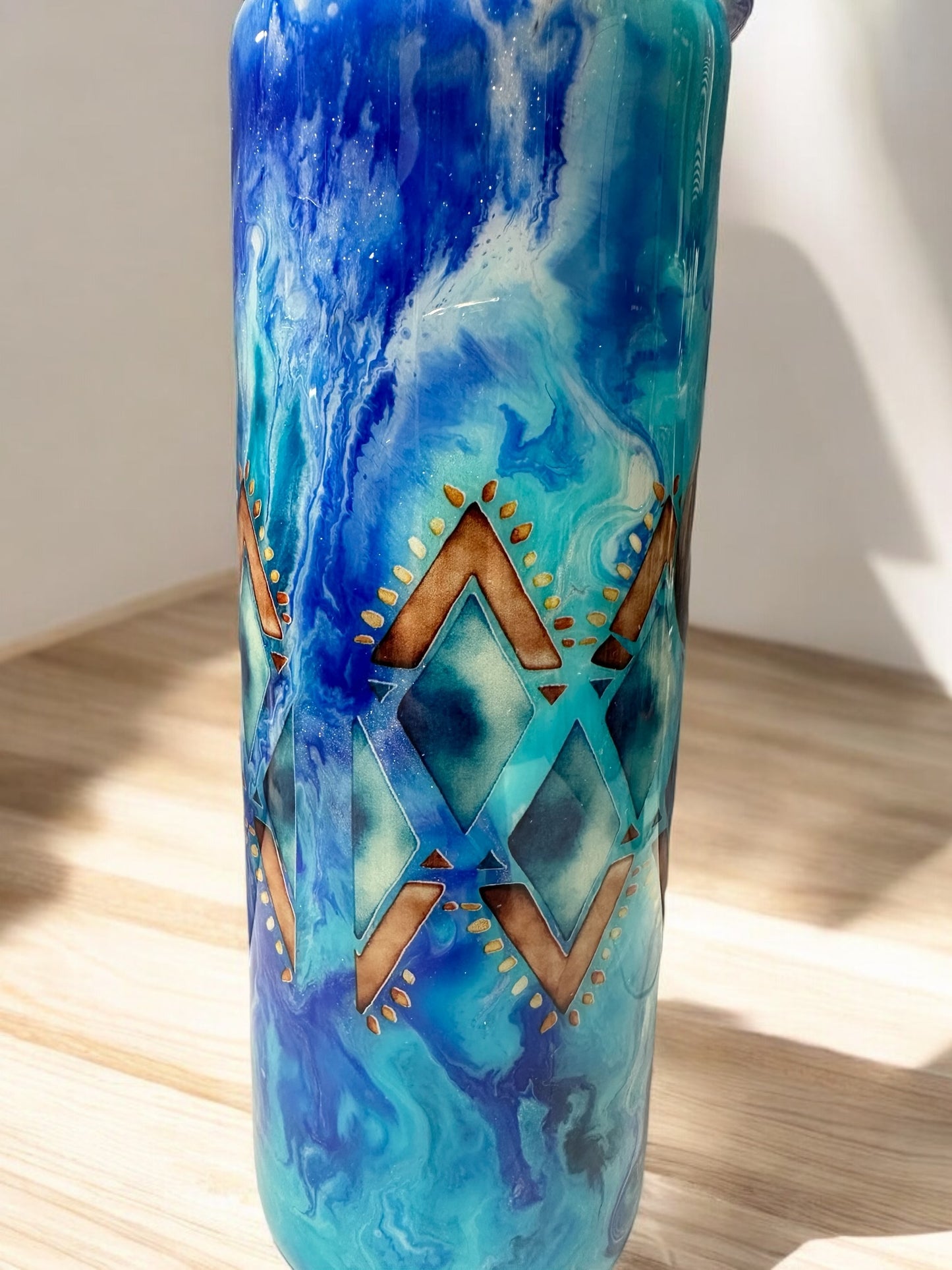 Cow skull 20 oz tumbler with blue background