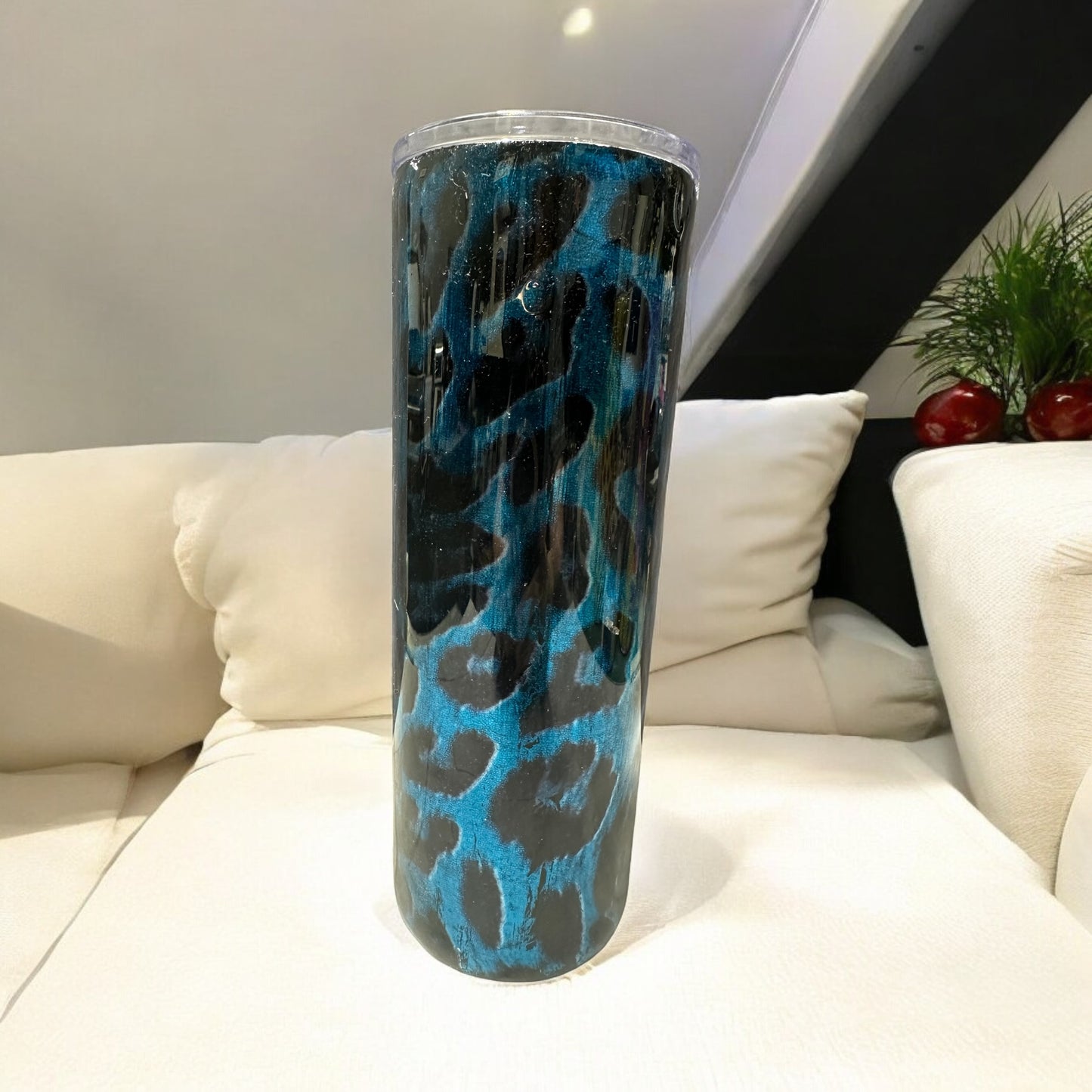 Leopard print with stunning blue background 20 oz tumbler